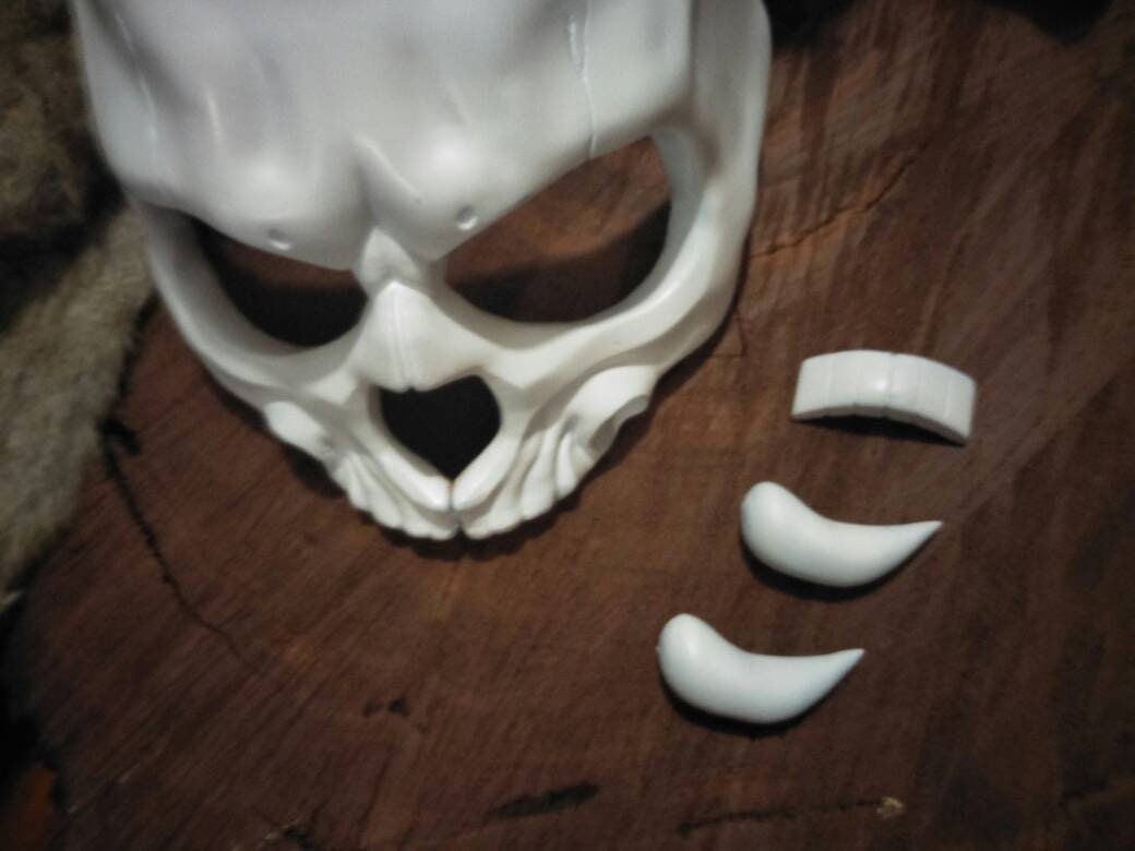 Half skull tusk mask