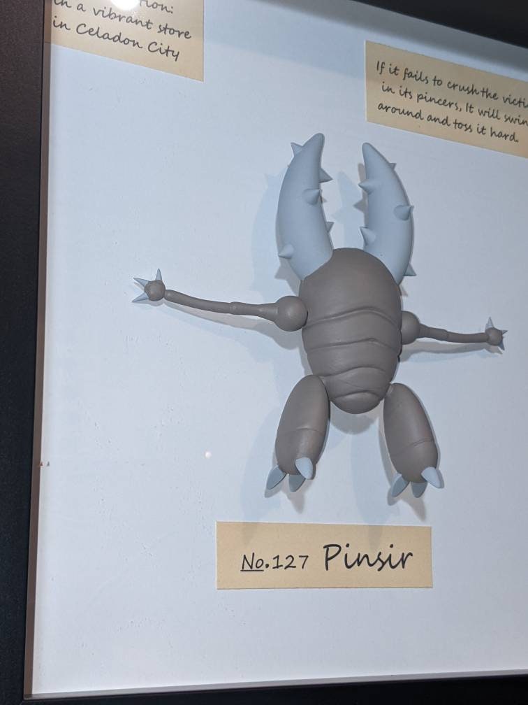 Handmade Pokemon inspired taxidermy of Pinsir